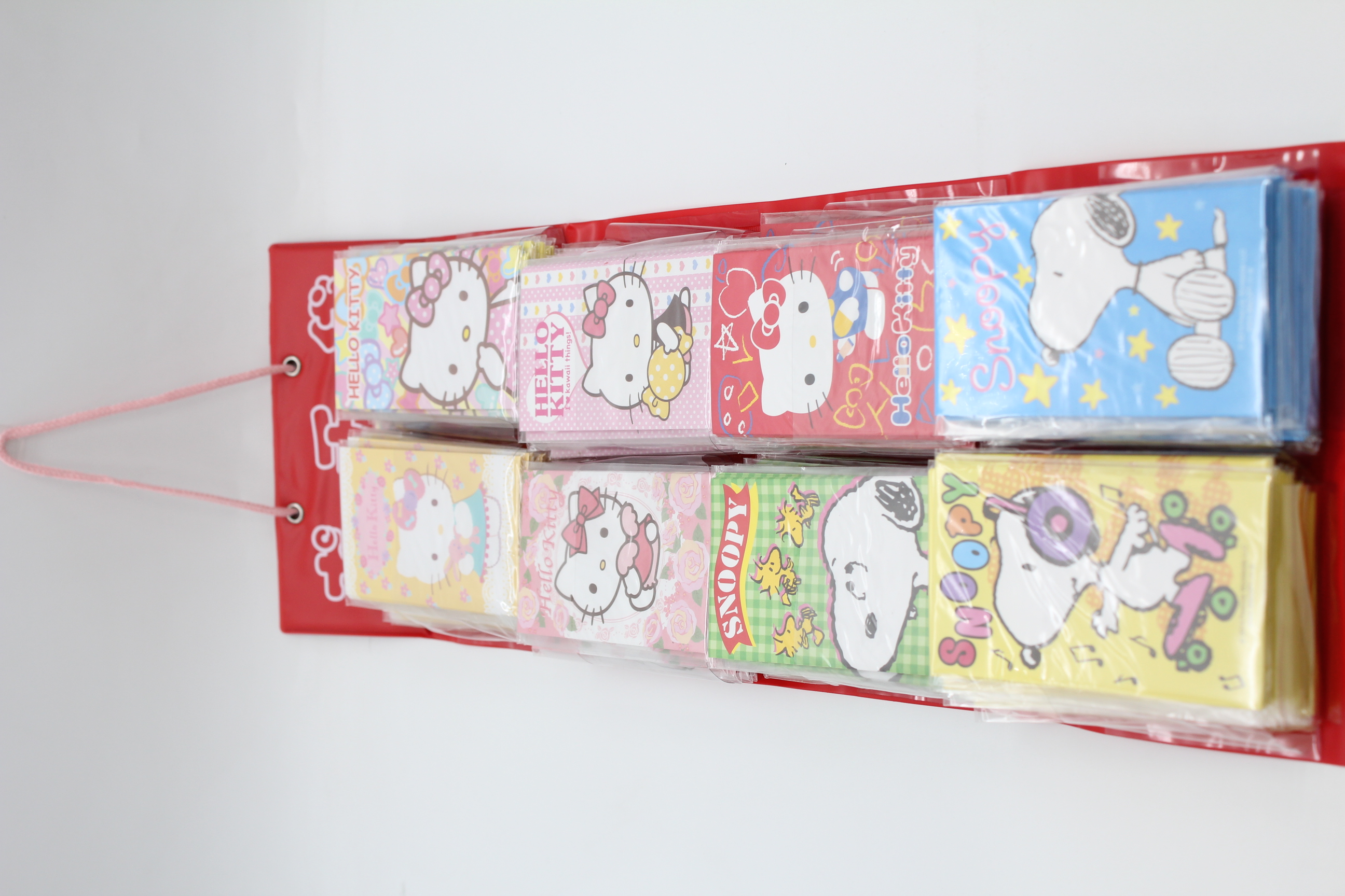 【ｽﾎﾟｯﾄ在庫限り】　吊り下げポチ　キティ＆スヌーピー